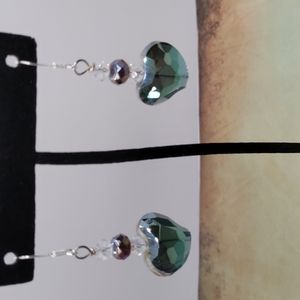 Handmade iridescent heart earrings.